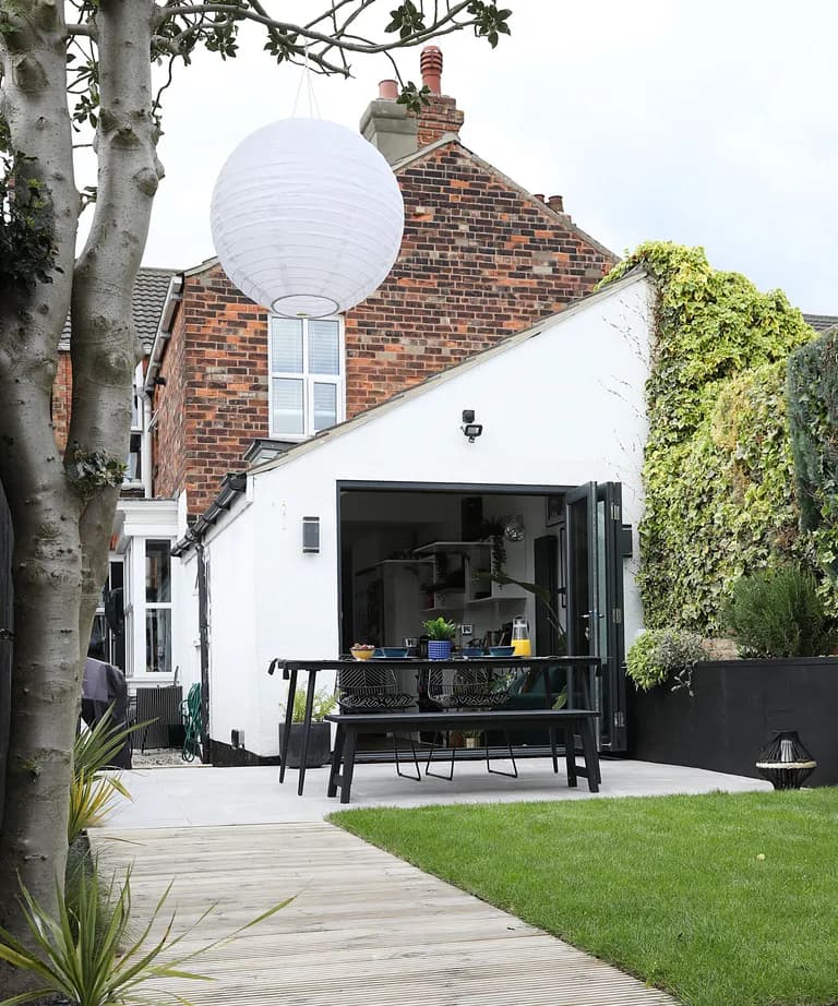 Revamped garden with a festival feel featuring vibrant landscaping